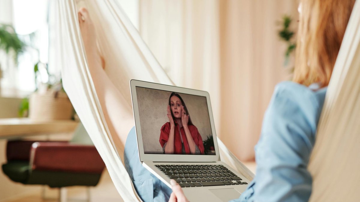 Business professional watching a video marketing presentation